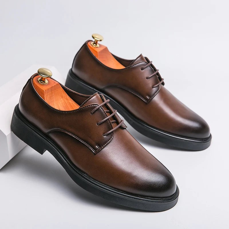 Brown leather lace-up shoe shown from side angle on plain background