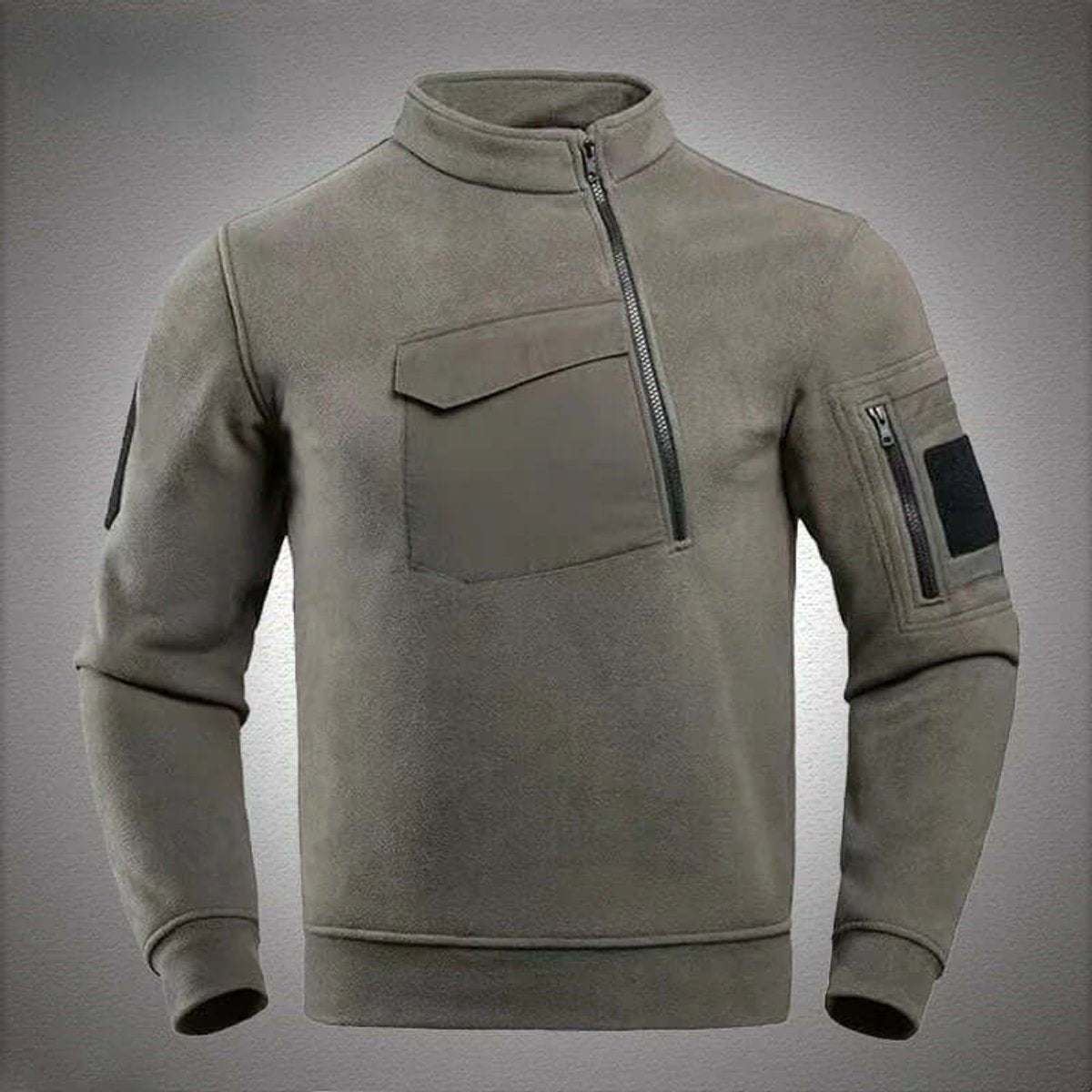Sage green tactical fleece jacket with quarter-zip and chest pocket detail