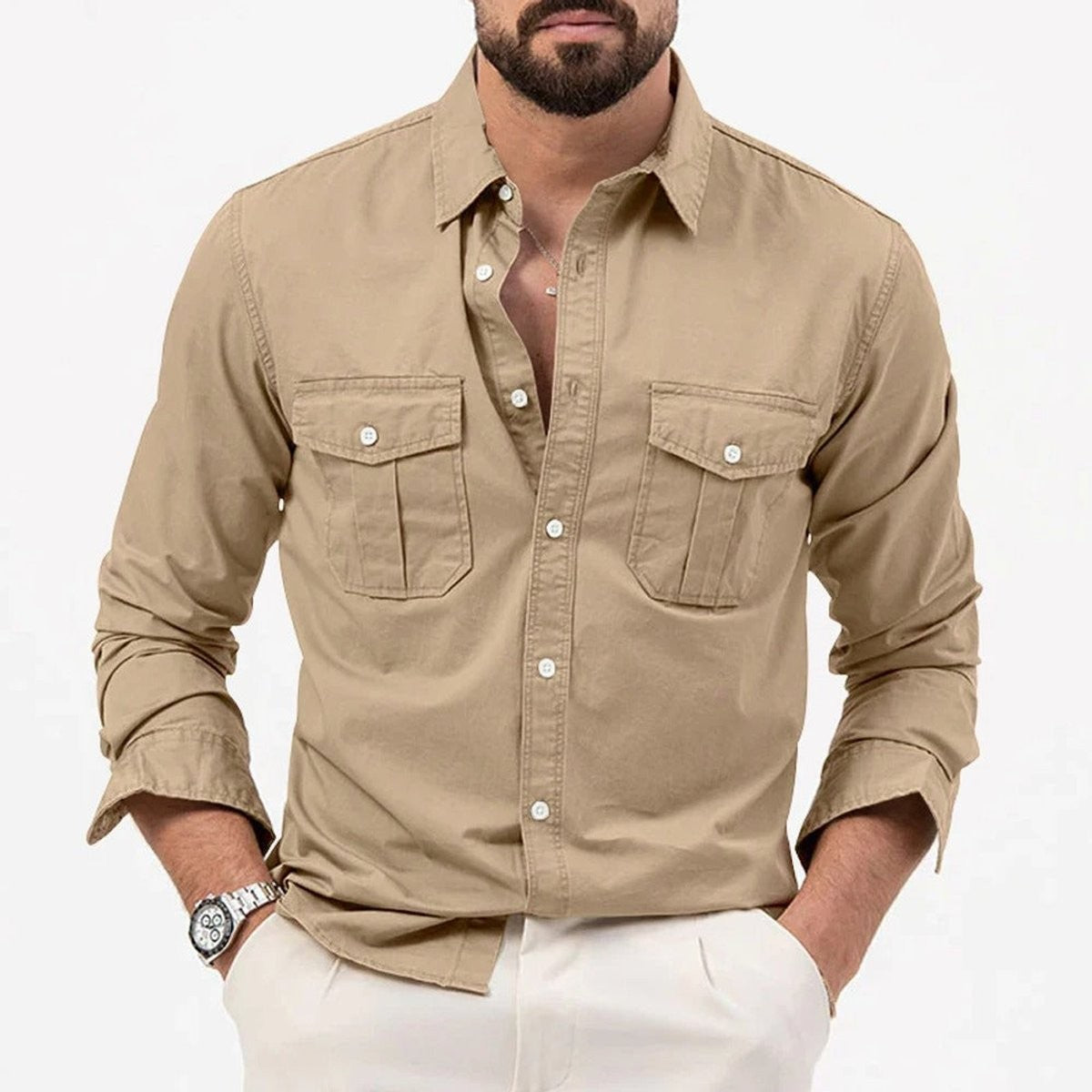 Man wearing khaki dual-pocket button-up shirt with rolled sleeves
