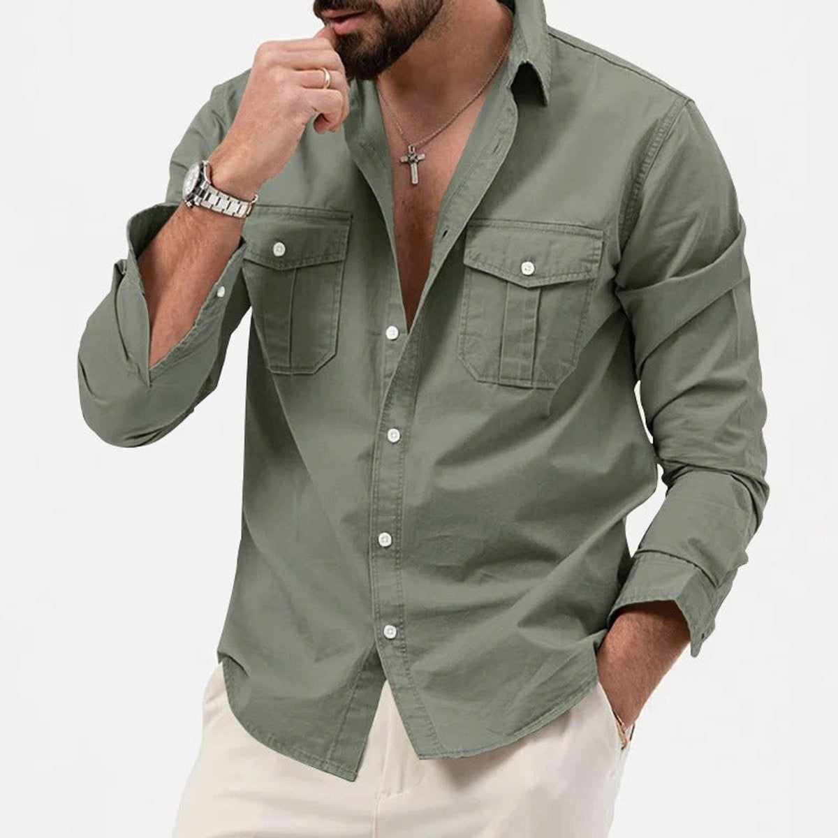 Sage green cotton button-up shirt with dual chest pockets on model