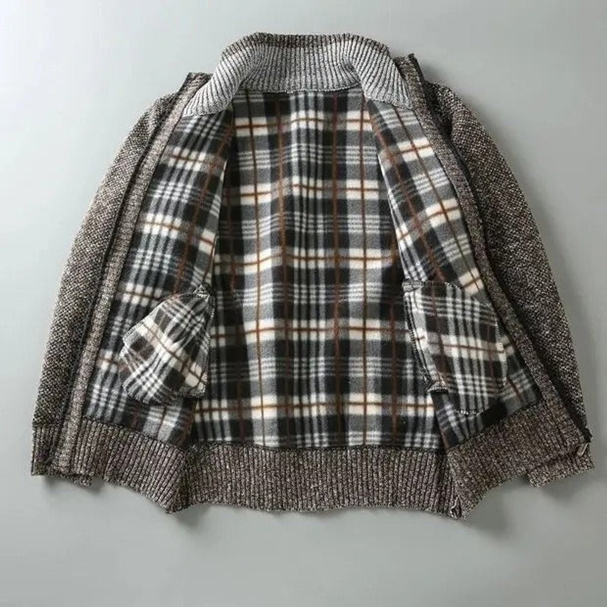 Close-up of black, white and rust tartan flannel jacket lining