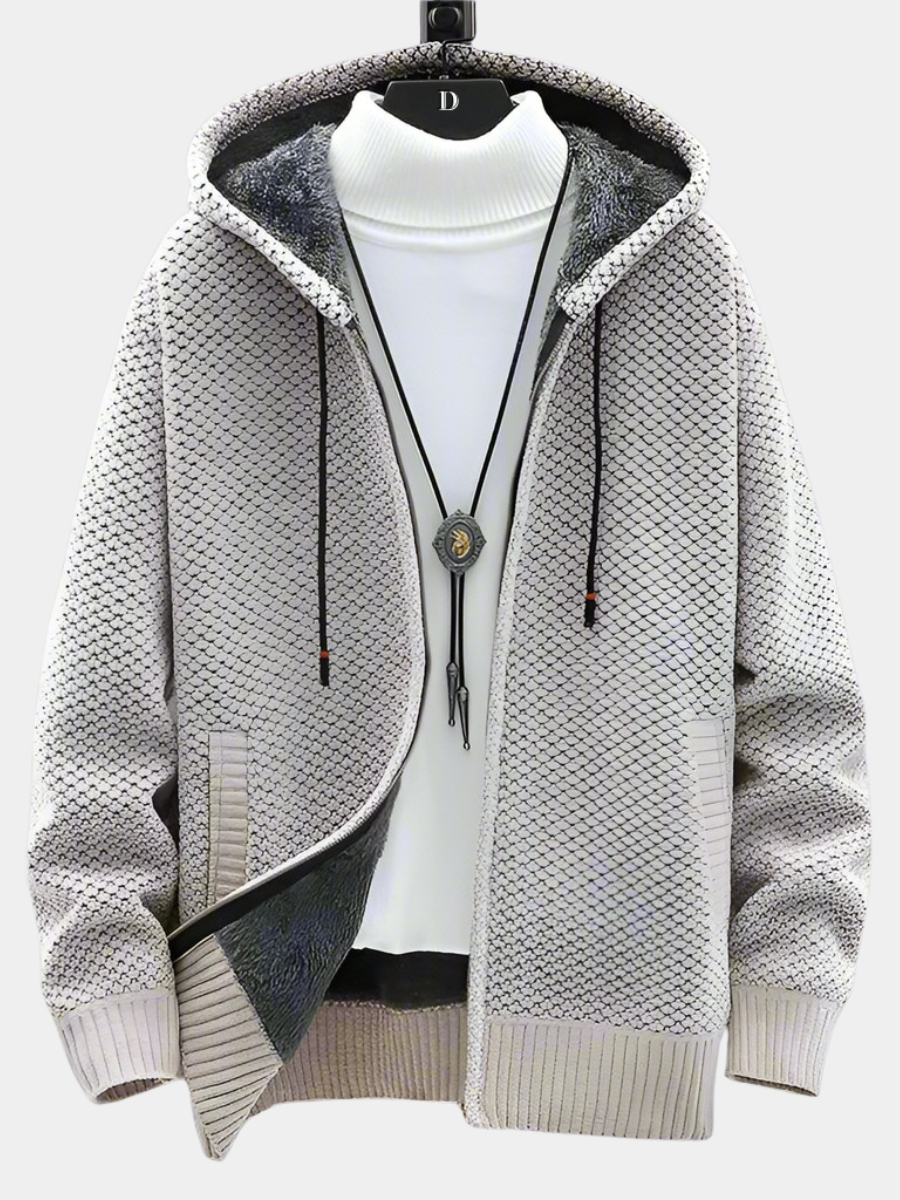 Grey knitted zip-up hoodie with fleece-lined hood on hanger display
