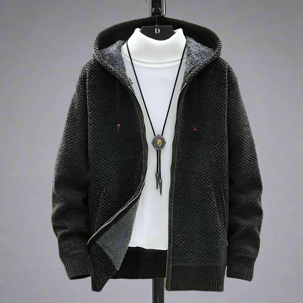 Black textured knit zip hoodie with fleece-lined hood on display