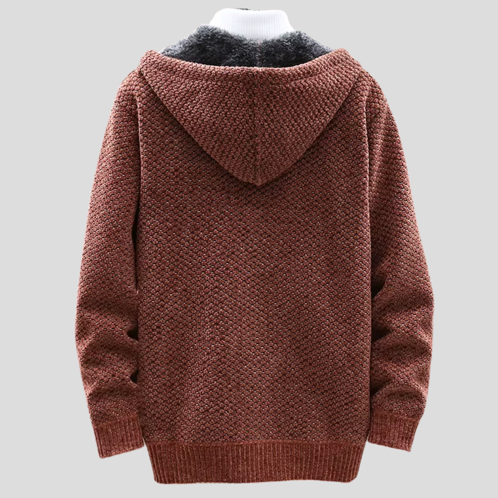 Rear view of rust red knitted hoodie with ribbed hem and hood