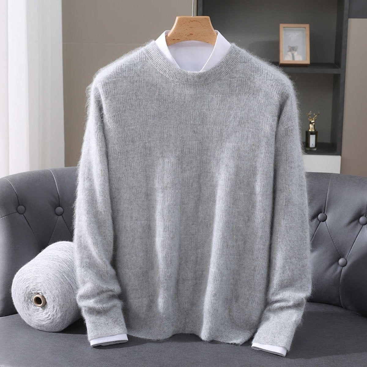 Light grey mink-blend pullover with ribbed neckline and soft brushed knit texture