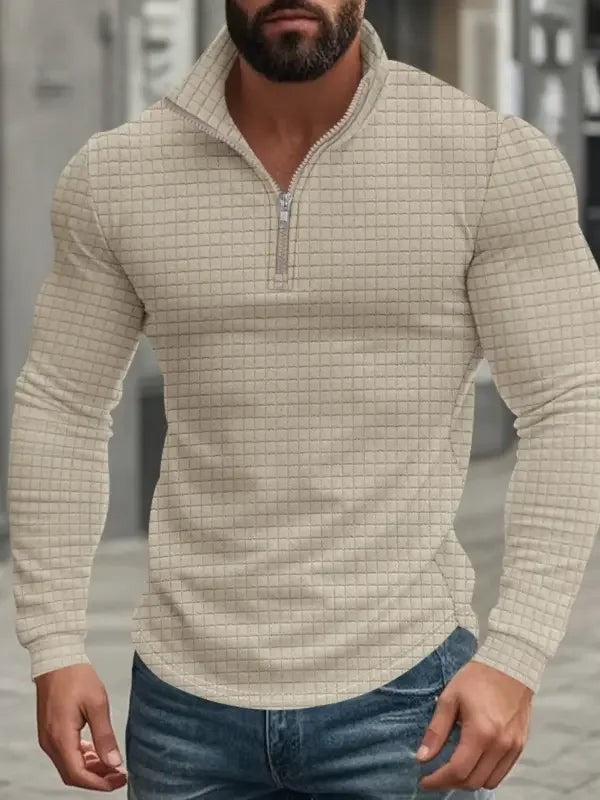 Beige quarter-zip sweatshirt with waffle texture and curved hem detail