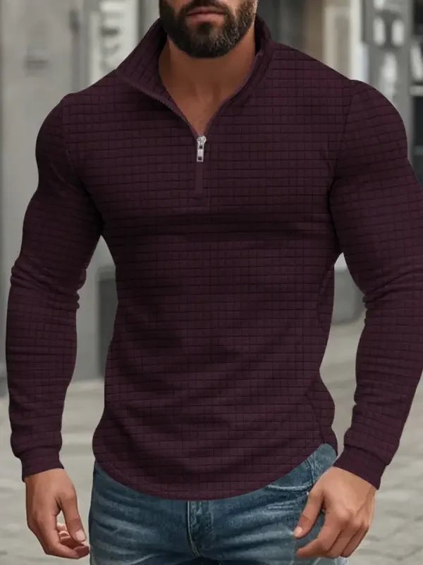 Burgundy waffle-textured quarter-zip sweatshirt with long sleeves