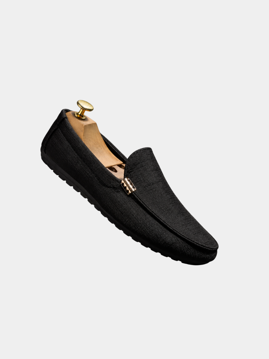 Black textured canvas slip-on loafer with gold bar buckle detail