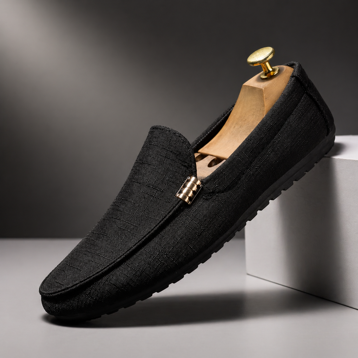 Black woven canvas driving loafer featuring gold-tone buckle trim