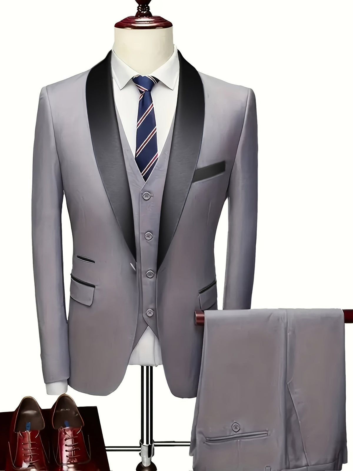 Grey three-piece shawl-collar suit displayed with brown leather shoes