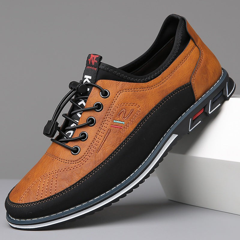 Brown leather casual shoe with black sole and contrast stitching