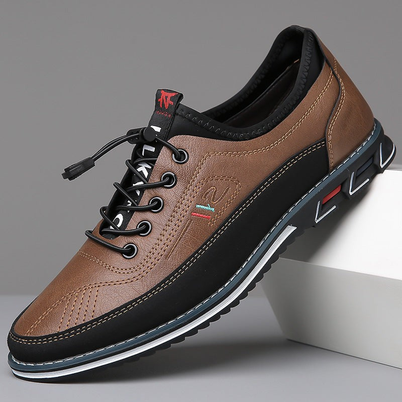 Camel leather lace-up shoe featuring black overlay and rugged sole