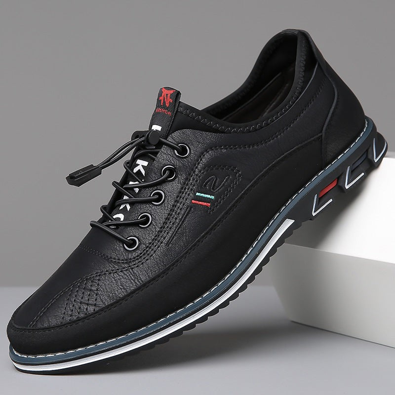 Black leather men's casual shoe with toggle laces and ridged sole