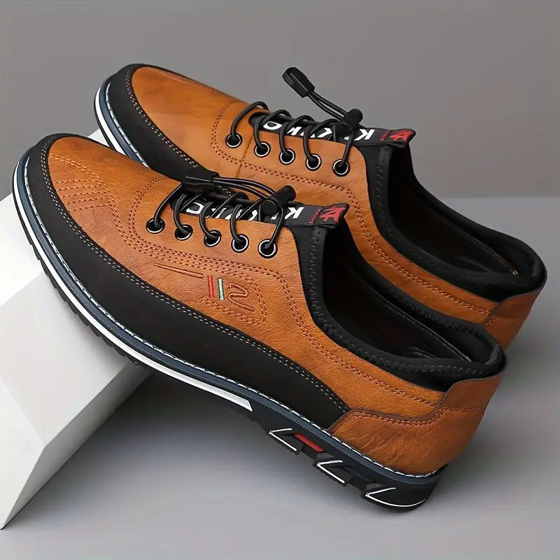 Tan leather shoes with black heel counters shown stacked together