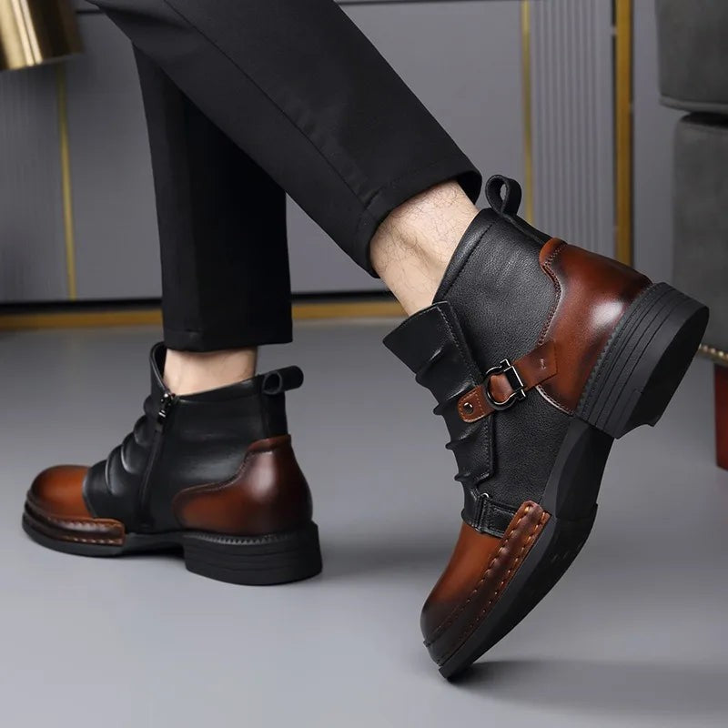 Close-up view of pleated leather ankle boots with buckle fastening