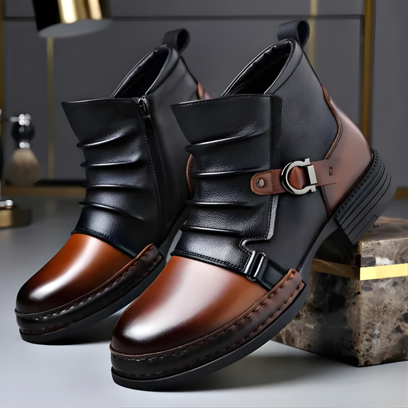 Pair of men's leather ankle boots with buckle detail and pleated shaft