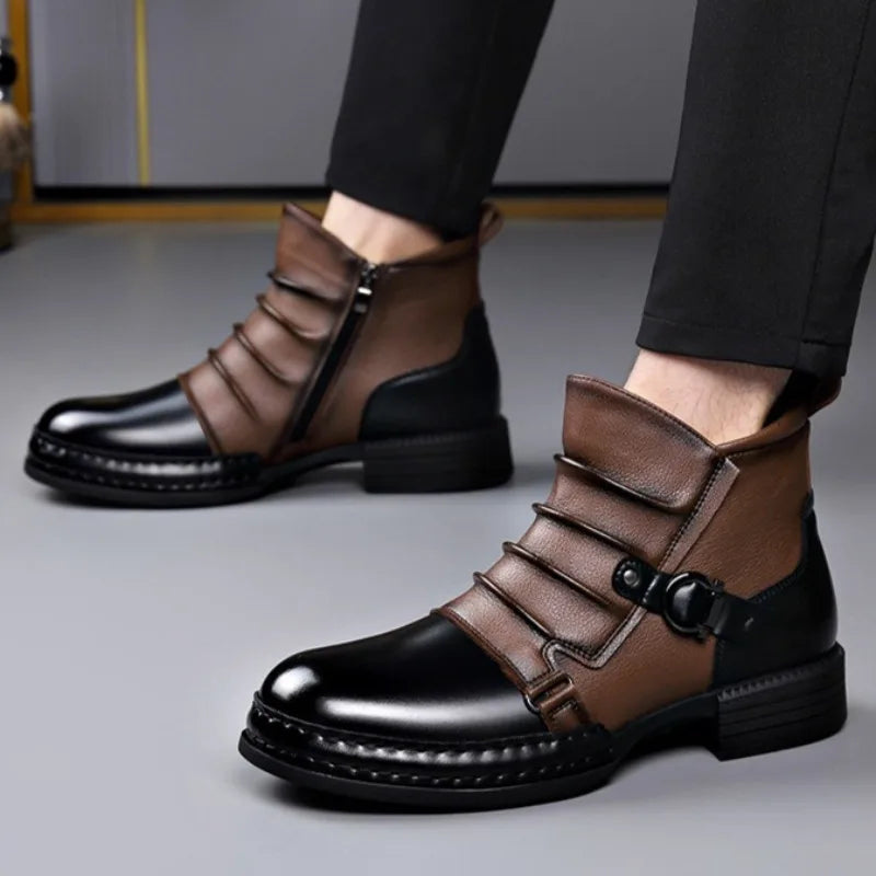 Close-up of leather ankle boots showing buckle fastening and ridged sole