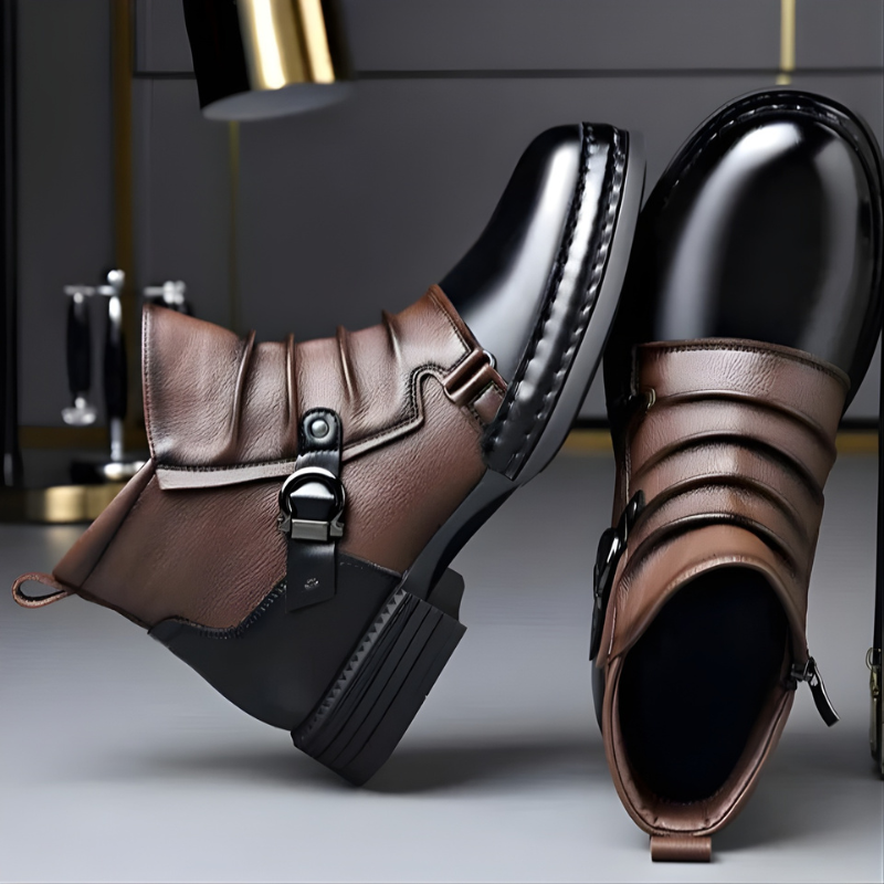 Leather ankle boots with buckle accent worn with tailored trousers