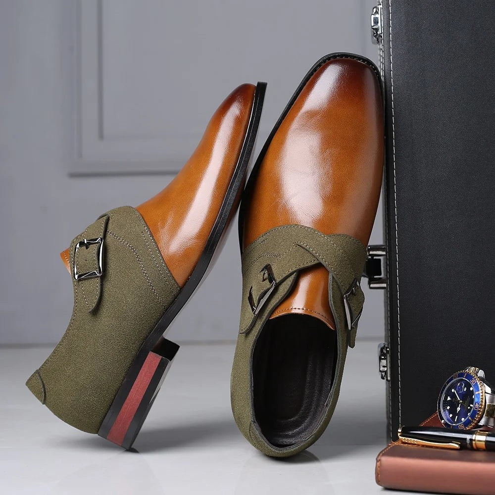 Pair of tan and khaki suede monk strap loafers beside briefcase