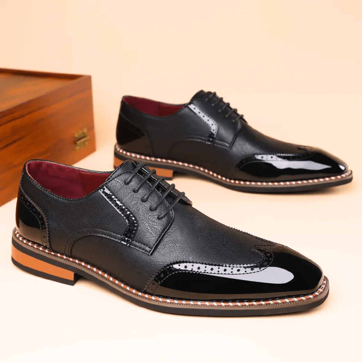 Black patent and leather brogue Oxford shoes with contrast stitched sole