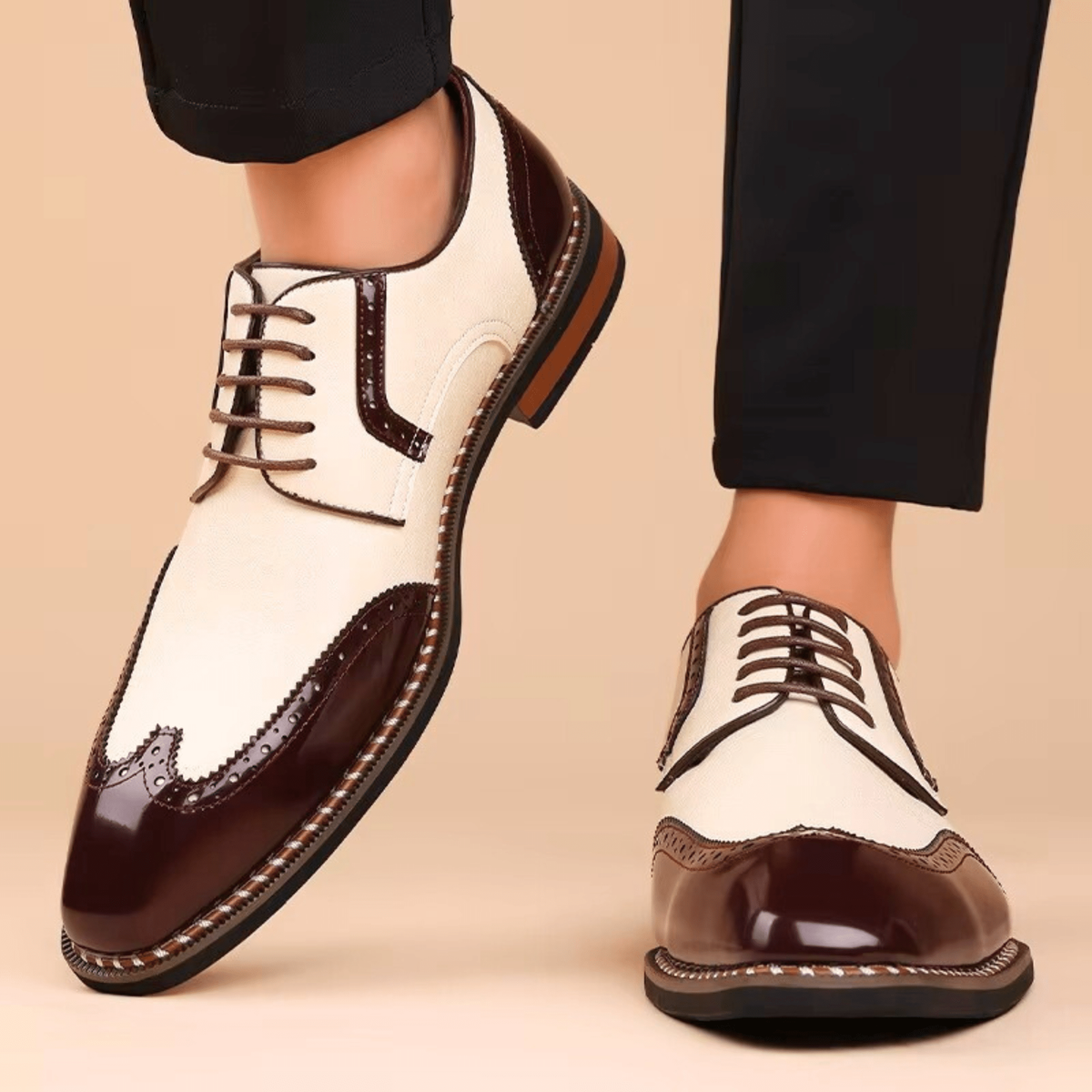 Man modelling brown leather brogue shoes with contrast patent detailing