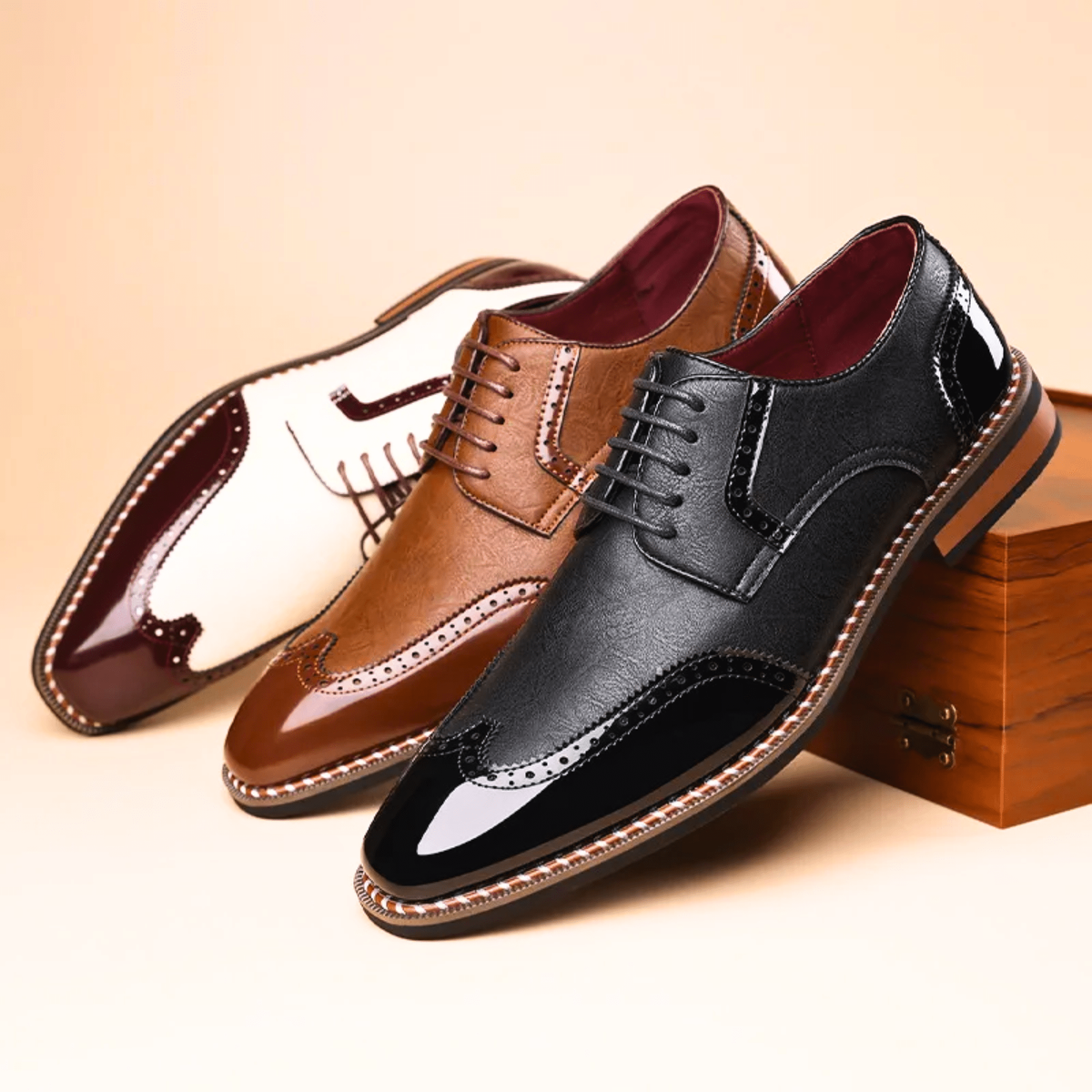 Trio of men's two-tone brogue dress shoes in contrasting colourways