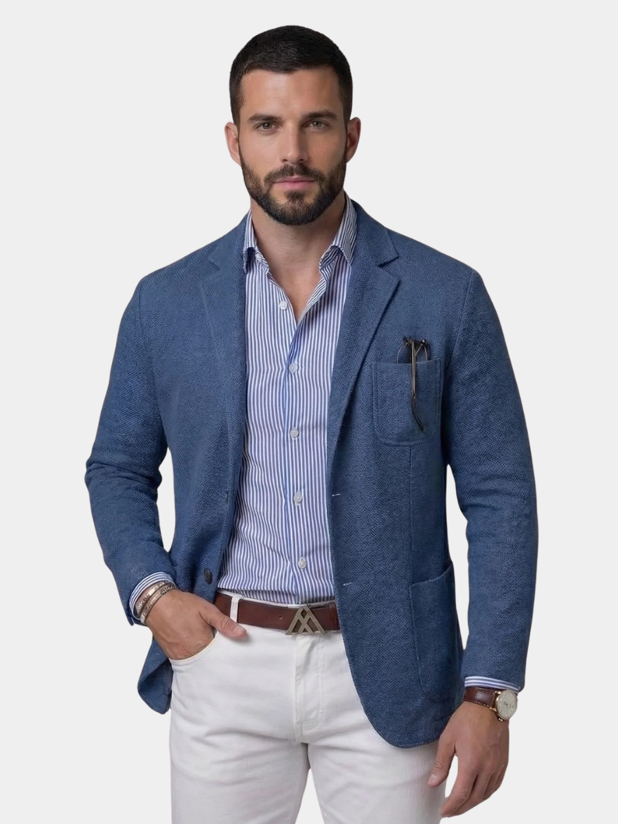 Textured blue blazer worn with striped shirt and white trousers