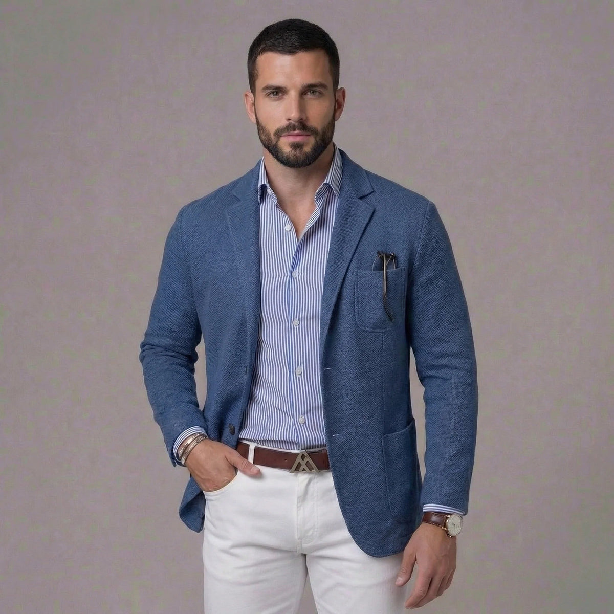 Man modelling textured blue blazer with pocket square detail