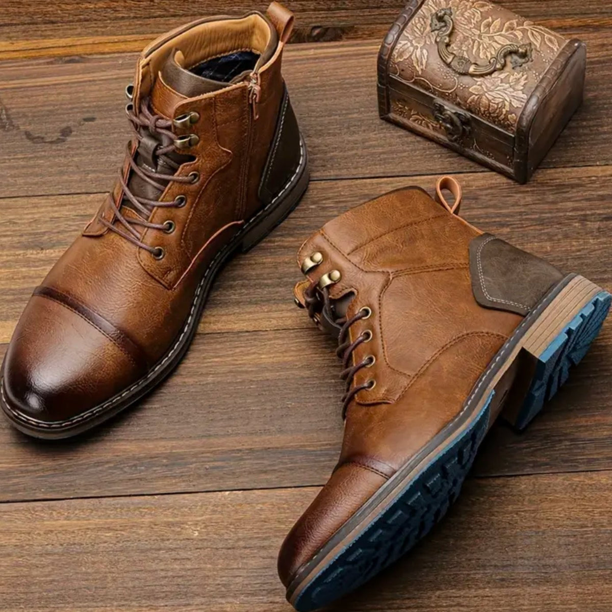 Men's brown leather lace-up boots with cap toe and contrast blue sole