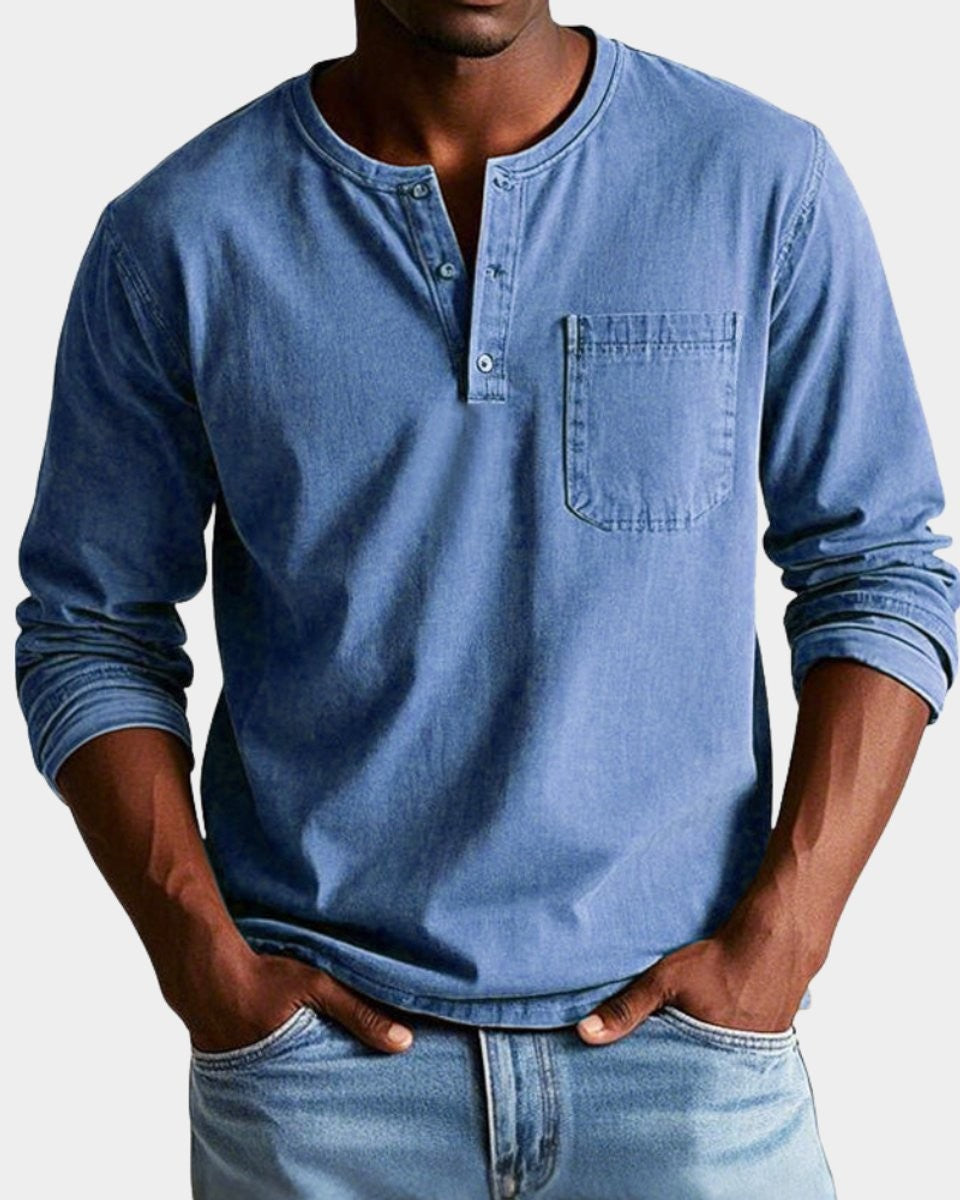 Men's blue henley shirt with chest pocket and long sleeves