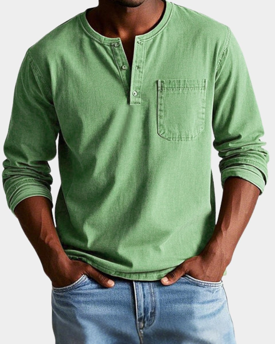 Sage green henley shirt with buttoned neckline and chest pocket