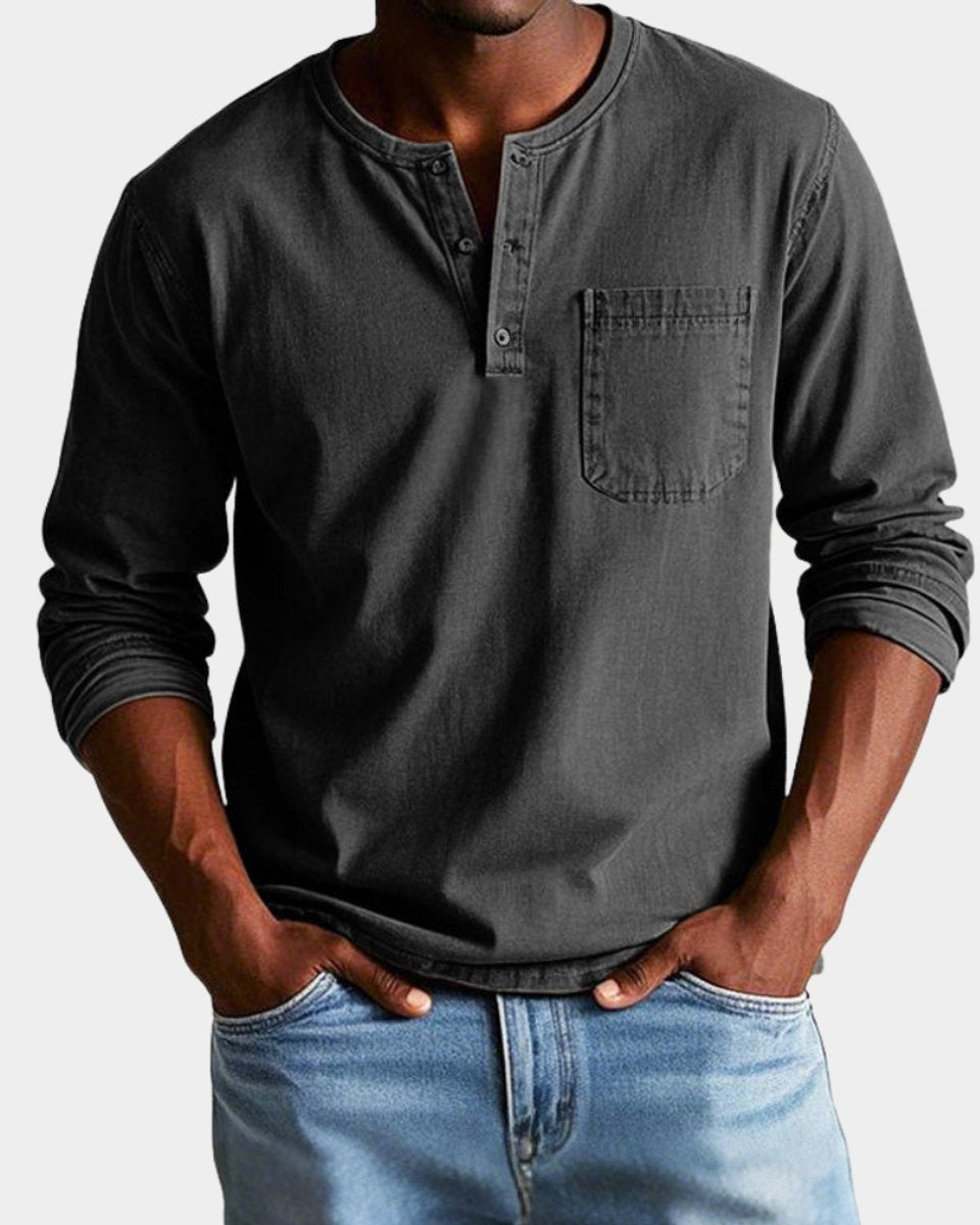 Charcoal henley shirt featuring buttoned neck and patch pocket