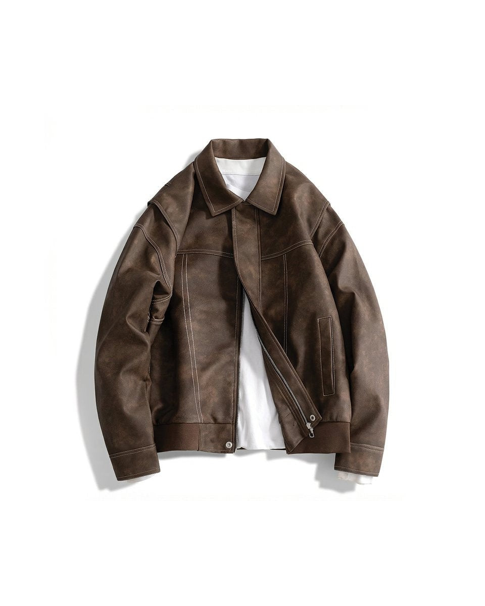 Brown faux leather bomber jacket with contrast stitching, laid flat
