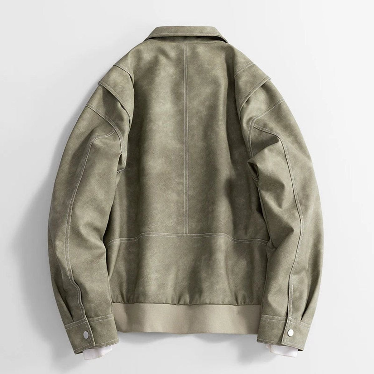 Back view of sage green faux leather bomber jacket with seam detailing