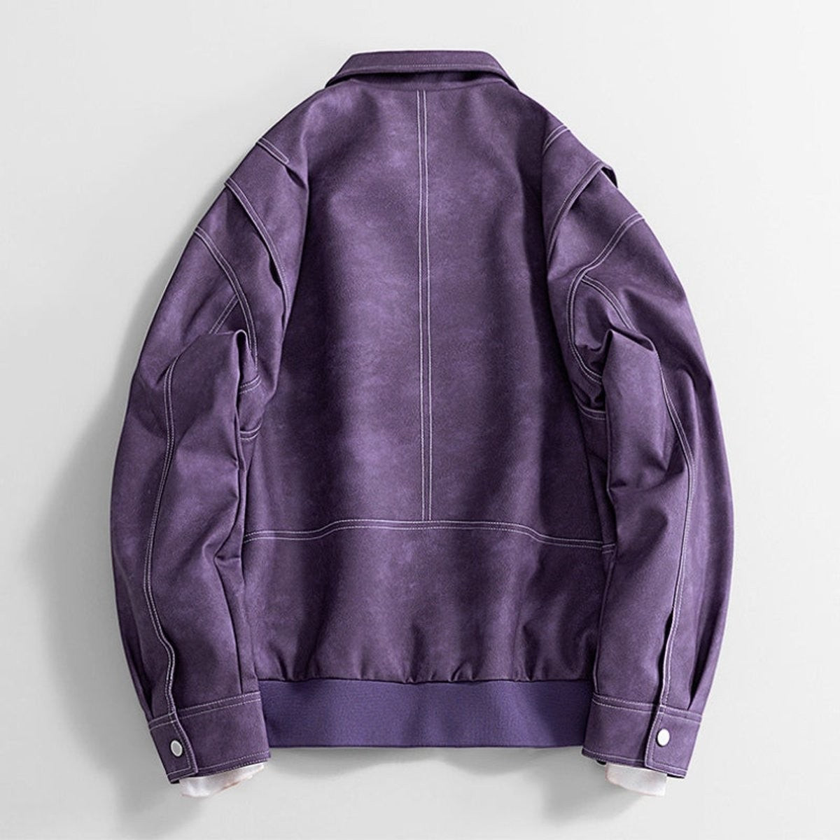 Back view of purple faux leather bomber jacket, oversized silhouette