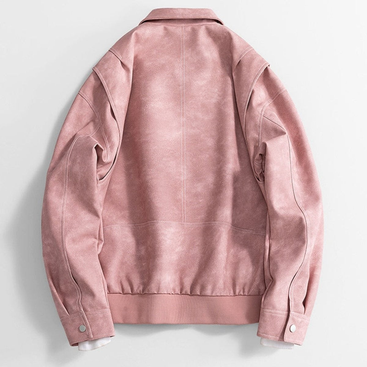 Back view of dusty pink faux leather bomber jacket with contrast seams