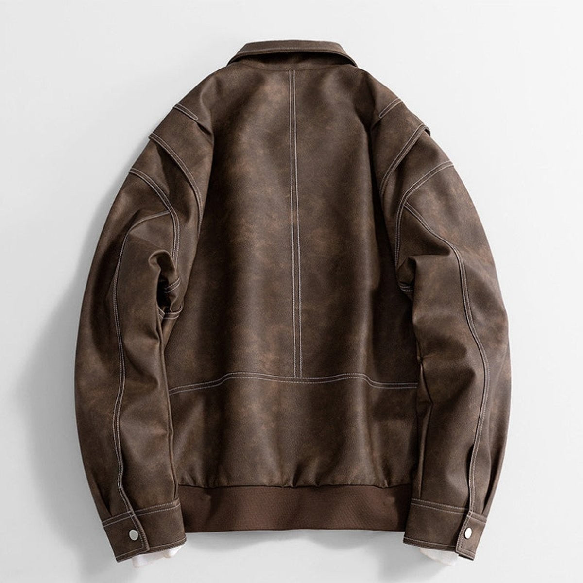 Back view of brown faux leather bomber jacket with contrast seams