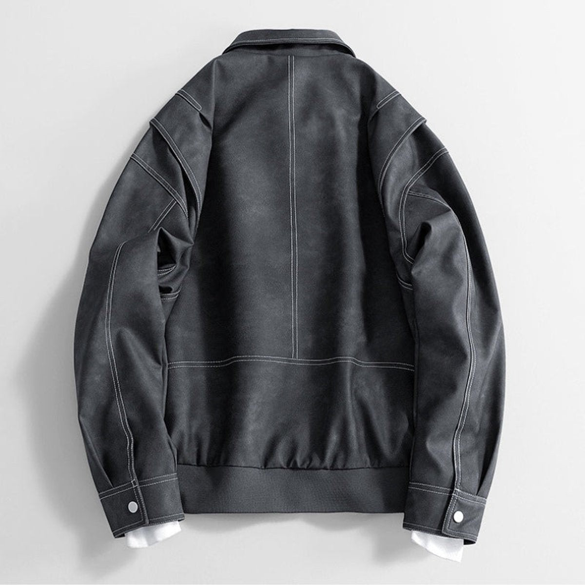 Back view of charcoal grey faux leather bomber jacket, oversized fit