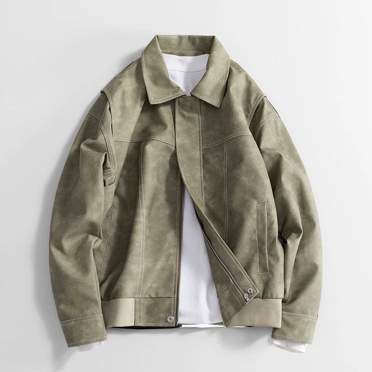 Sage green faux leather jacket with turn-down collar, laid flat