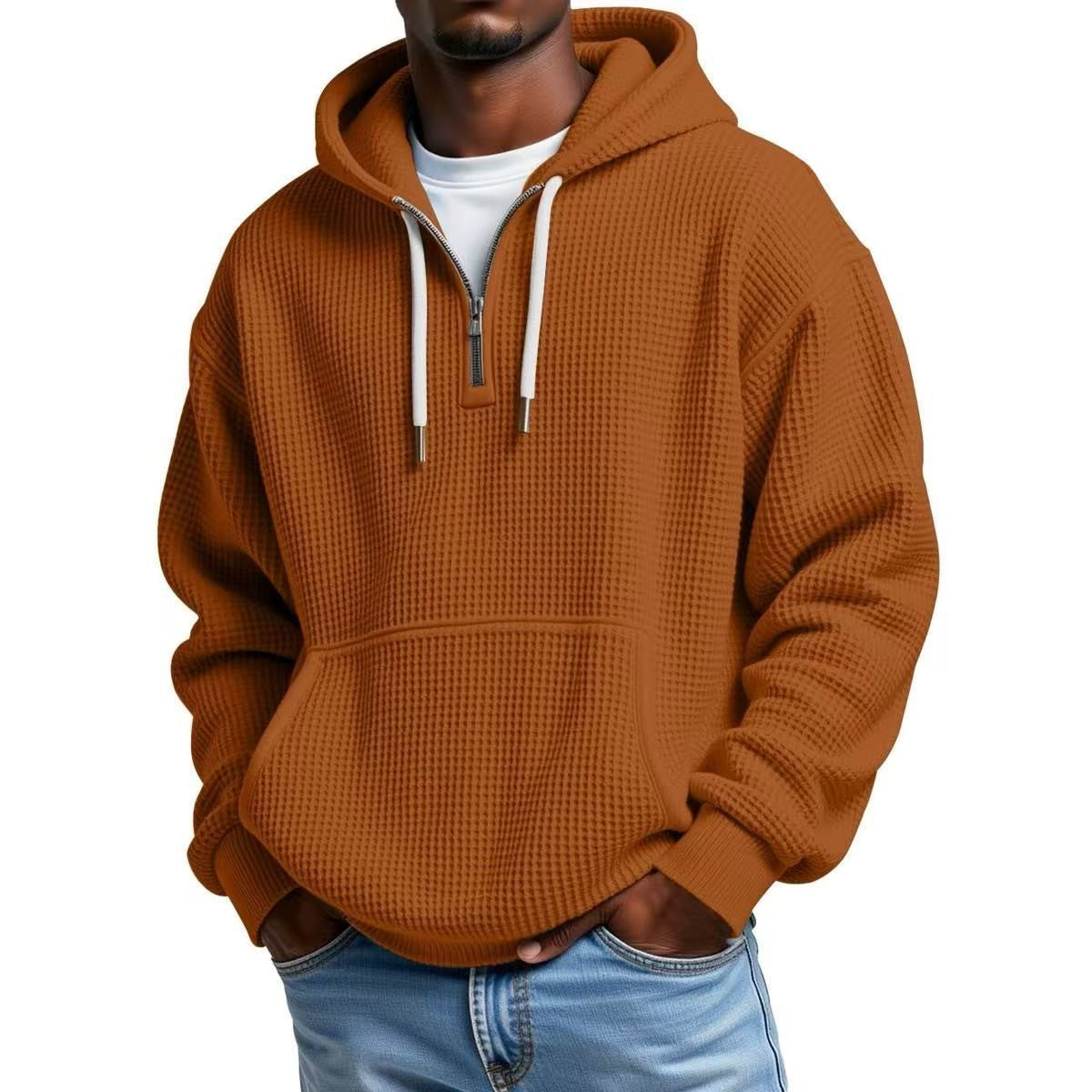 Rust orange waffle knit hoodie with white drawcords and hood