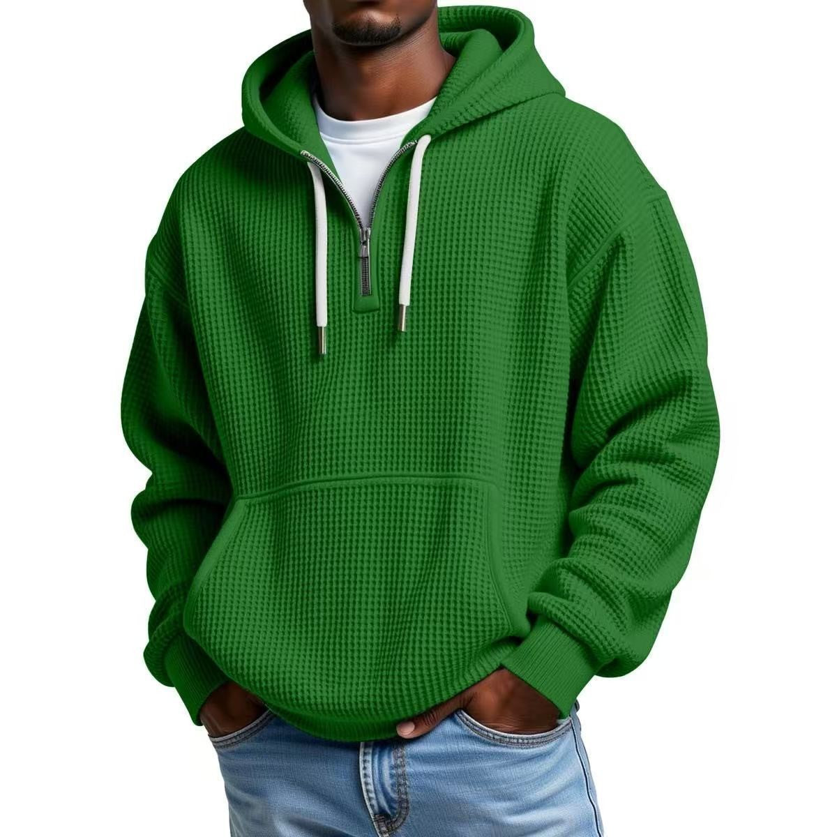 Bright green textured hoodie featuring quarter-zip and front pocket