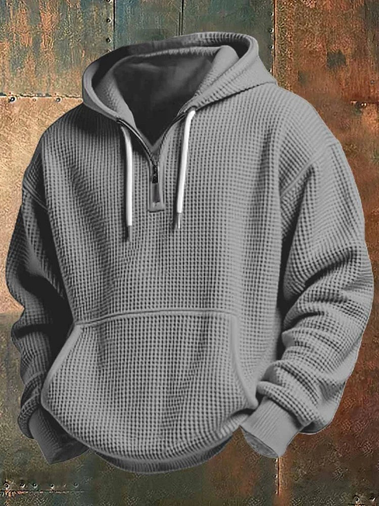 Grey waffle knit hoodie with contrast white drawcords and zip collar