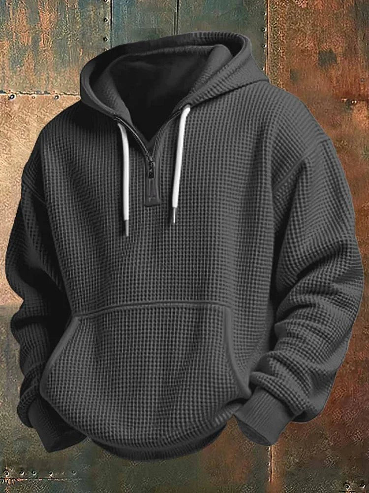 Charcoal grey waffle knit hoodie with half-zip and drawstring hood