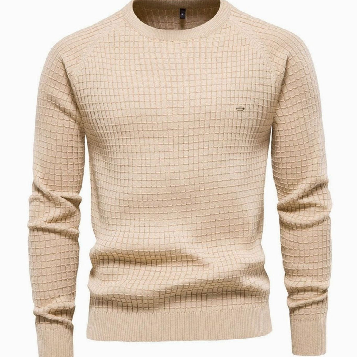 Beige waffle-knit crewneck jumper showing textured raglan sleeve detailing