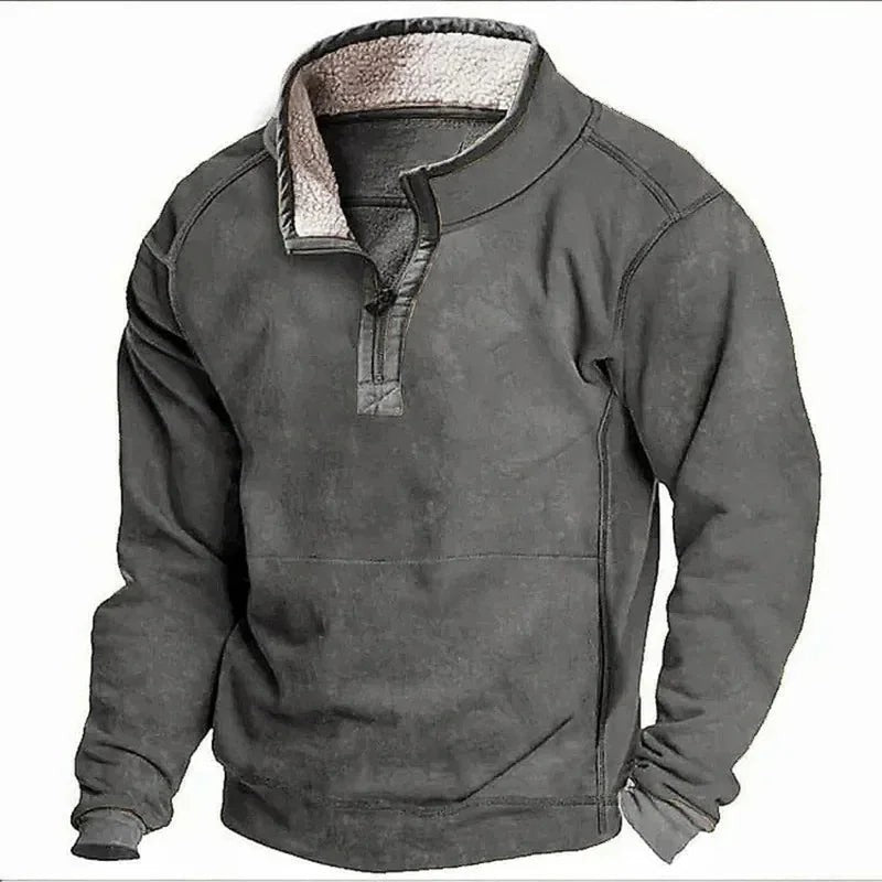 Charcoal grey sherpa-lined pullover featuring quarter-zip neckline and kangaroo pocket