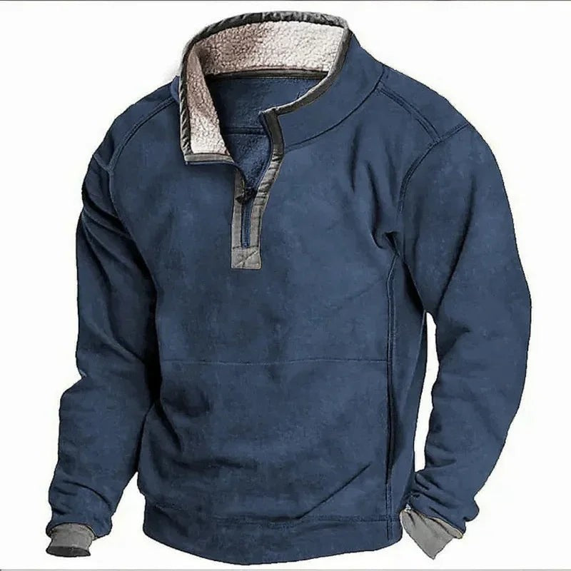 Navy blue sherpa-lined pullover with quarter-zip fastening and front pocket