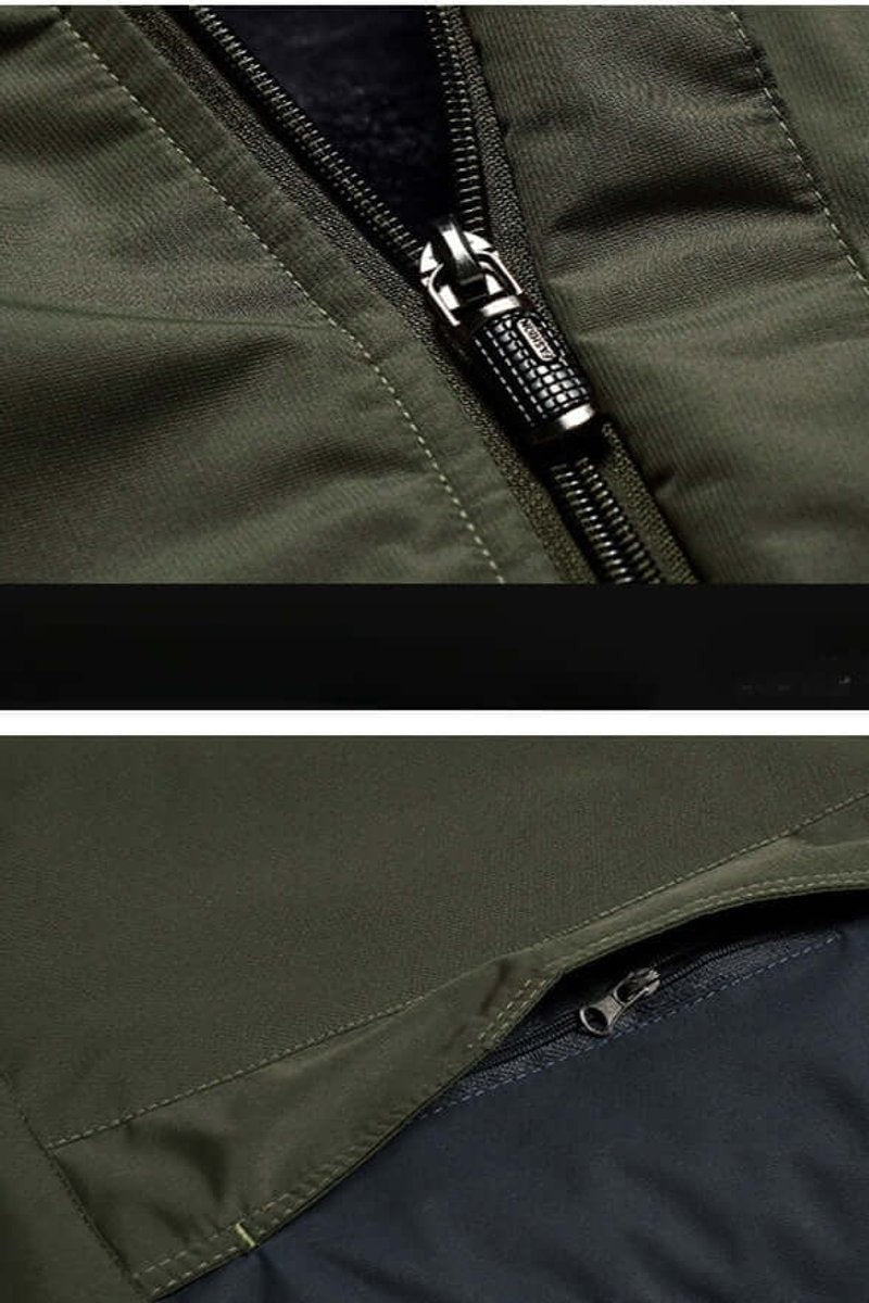 Detail shot of zip fastening and stitching on khaki green outdoor jacket