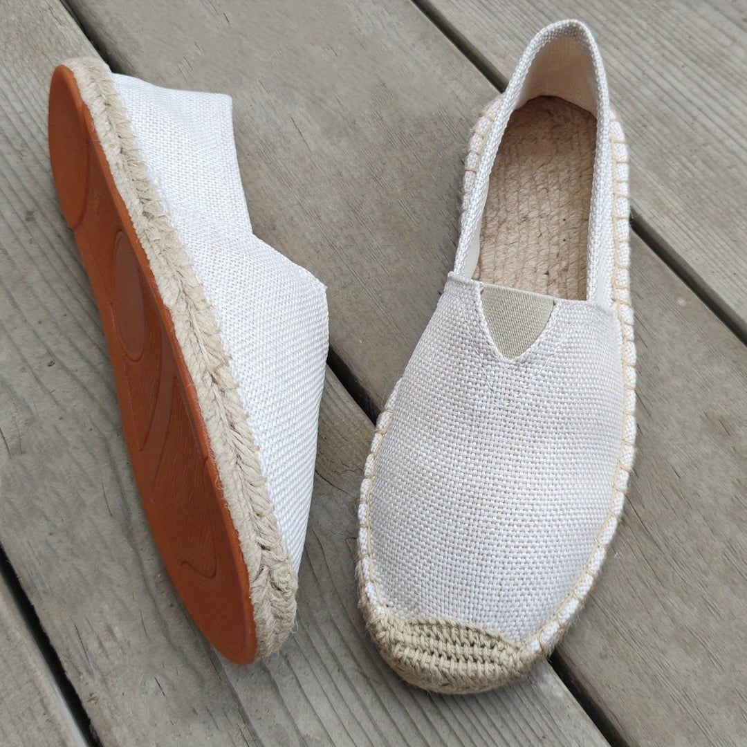 Off-white linen espadrilles with jute trim and tan rubber sole