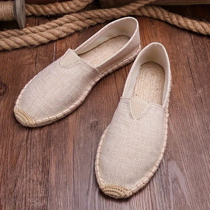 Beige woven linen espadrilles with crochet toe and rope edging
