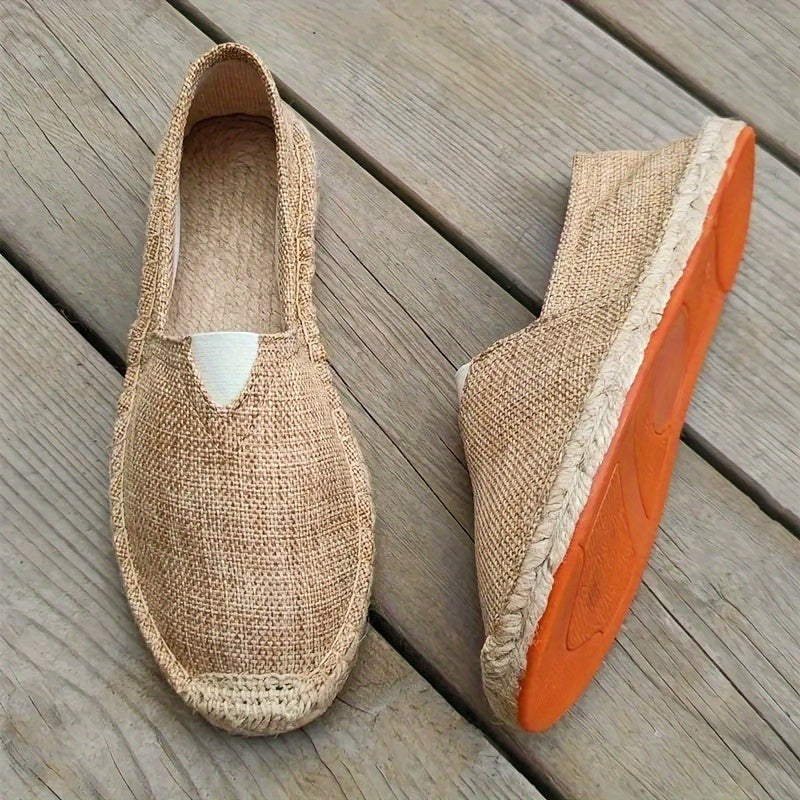 Natural jute-trimmed espadrilles with orange rubber sole, paired view